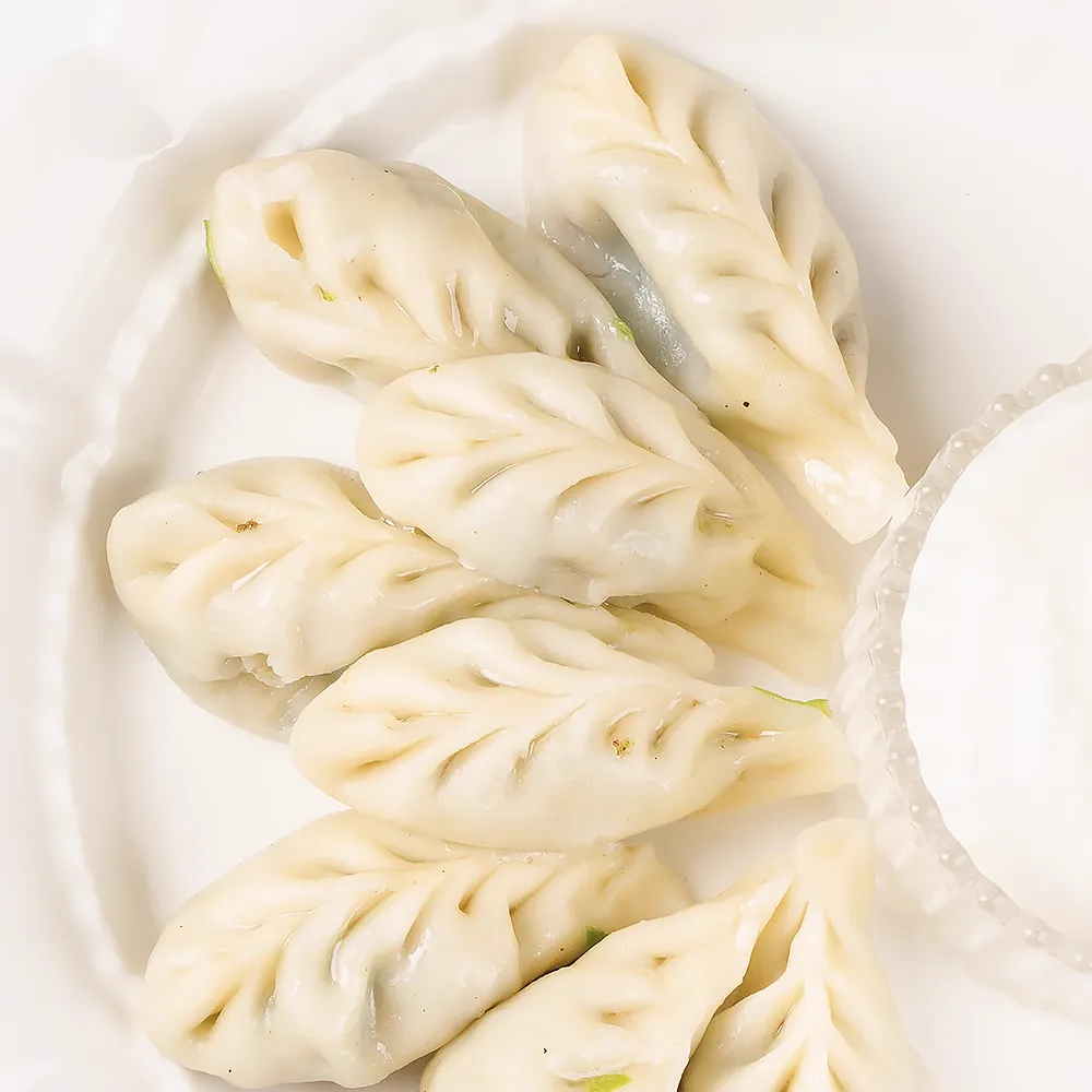 Пельмени с жусаем и мясом